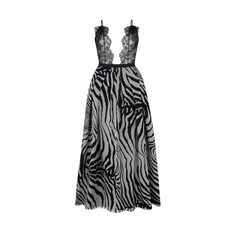 Dress with zebra pattern and lace top on a white background